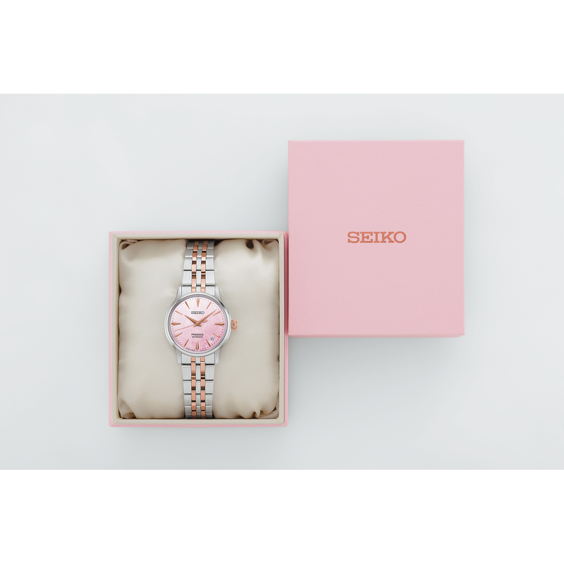 Seiko presage watch with a pink dial and automatic movement