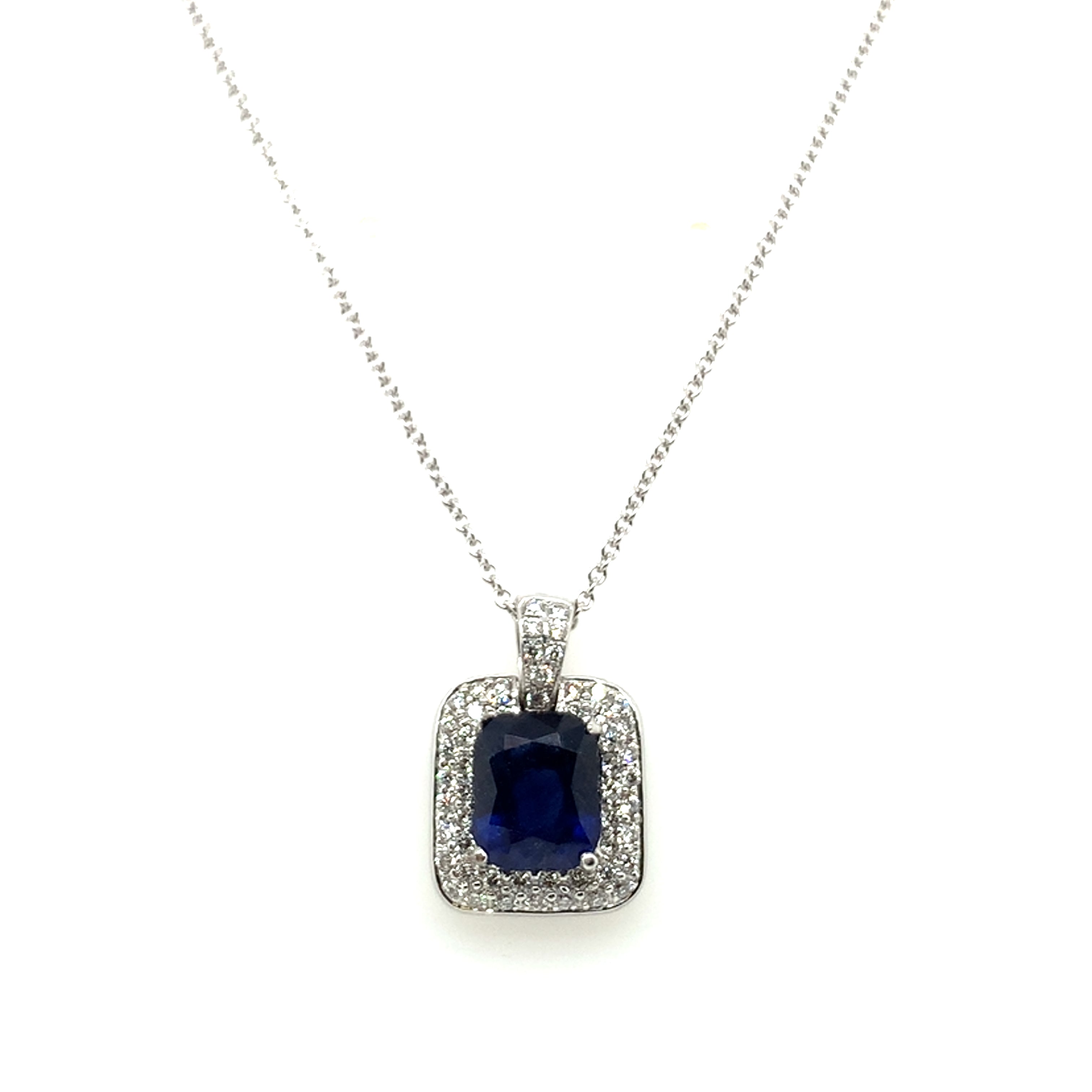 Blue Sapphire and Diamond Halo Pendant Necklace