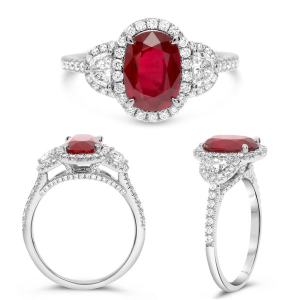 Oval Ruby and Diamond Three-Stone Halo Ring